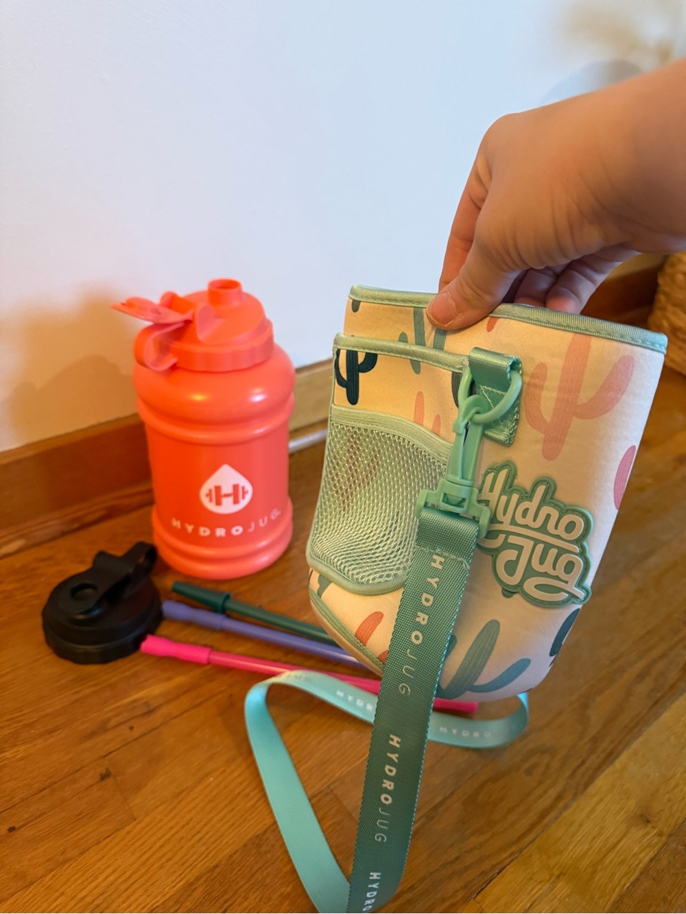 HydroJug Coral Orange Water Bottle with cactus Carry Strap, extra lid and straws